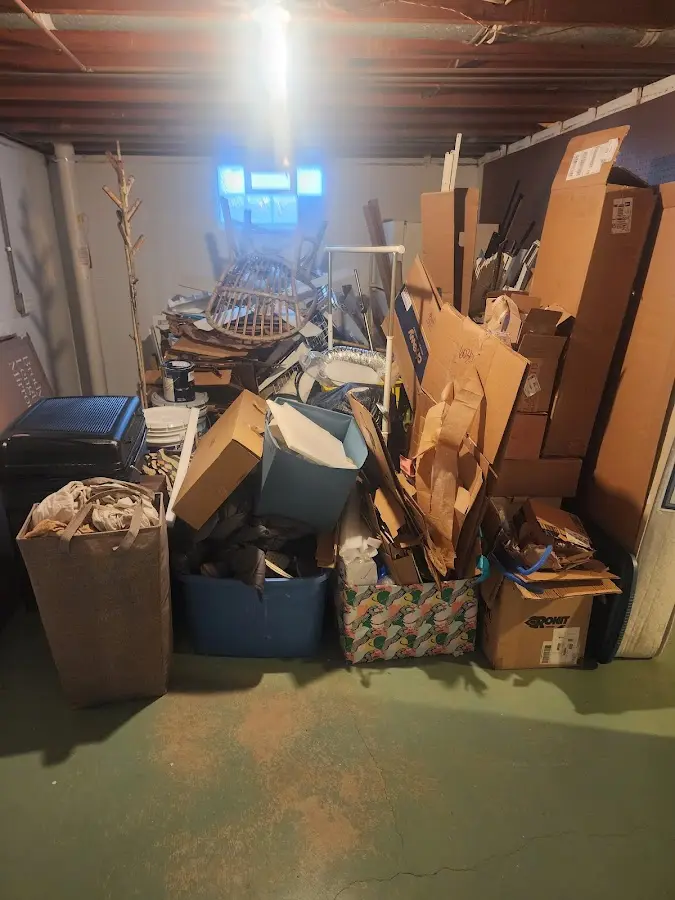 Roll-off dumpster container at job site for Yard Waste Dumpster Rental in Kearney